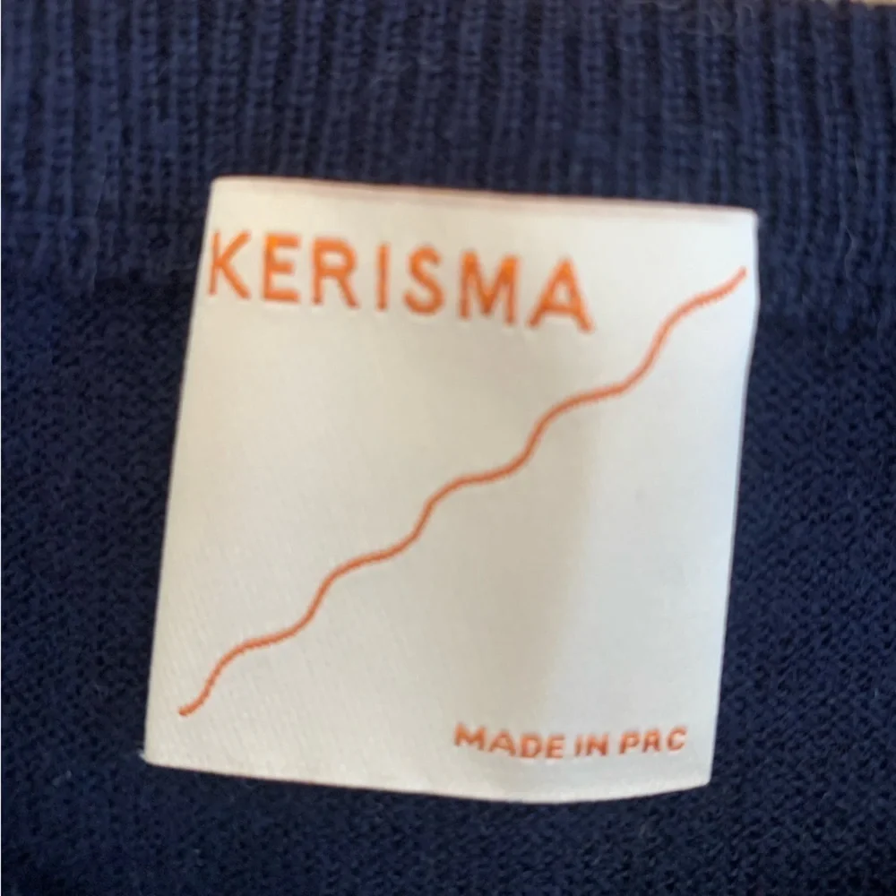 Kerisma wool blend sweater navy blue thin soft distressed edges capsule basic